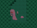 A tall pink creature eating chunks of the trees