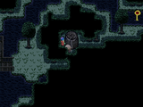 This creature appears when you pull out the chainsaw. It's trapped in the two-tile space behind that pillar, though.